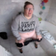 A fat, mature woman takes a shit while sitting on a toilet. Although no pooping sounds can be heard, some poop can be seen on her TP when she wipes her ass. Presented in 720P HD. About 3 minutes.